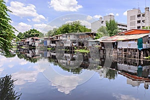 Urban ghetto house village canal side in Bangkok Thailand