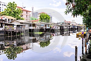 Urban ghetto house village canal side in Bangkok Thailand