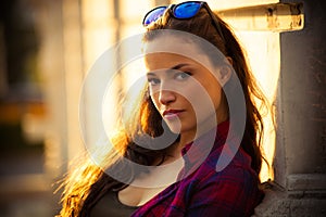 Urban girl portrait outdoor in the city summer day