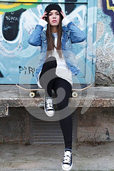 Urban girl with skateboard