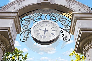 Urban historical vintage clock in street