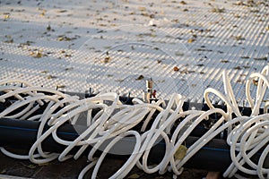 Urban ice rink piping system. Preparation of icy surface for winter activity, outdoor hockey