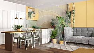 Urban jungle, kitchen and living room in white and yellow tones. Dining table, sofa and houseplants. Home garden interior design.