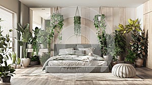 Urban jungle, modern bedroom in white and bleached wooden tones. Master bed, parquet floor and decors, houseplants. Home garden