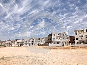 The urban landscape of beautiful white stone houses is Arab Islamic Islamic for ordinary citizens, townspeople in the desert again photo