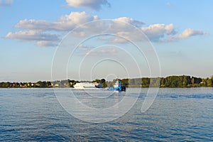 Urban landscape, boat on the river