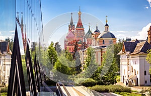 Urban landscape of Moscow, Russia. Modern building and old churches in Moscow city center, St Basil`s cathedral and Moscow Kremlin