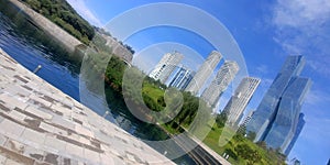 Urban landscape with park and buildings modern architecture in the background photo