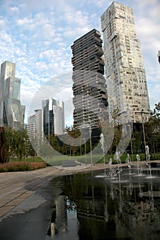 Urban landscape with park and buildings modern architecture in the background photo