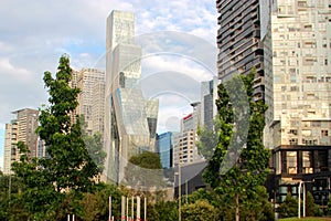 Urban landscape with park and buildings modern architecture in the background photo