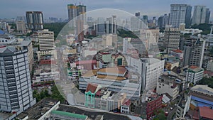 Urban landscape with train and skyscrapers. Amazing aerial top view flight drone