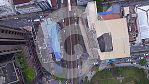 Urban landscape with train and skyscrapers. Great aerial top view flight drone