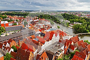 Urban landscape. View from top of German city of Lubeck. Beautiful view from high tower on roofs of city in Germany