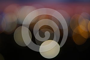 Urban lights abstract background or pattern. Blurred circles.