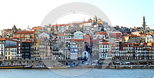 The urban multicolor facade of Porto view from Vila Nova de Gaia