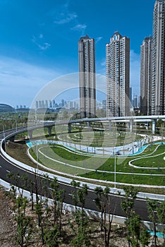 urban overpass bridge and modern buildings under blue sky