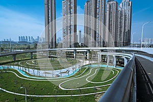 urban overpass bridge and modern buildings under blue sky