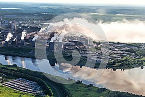 Urban panorama aerial view. Smokesting pipes of the metallurgical plant