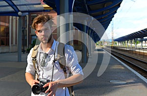 Urban photo and travelling concept. Tourist ready to take picture
