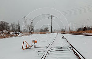 Urban railway system, tracks in snow, winter time