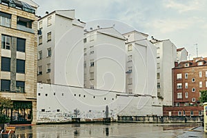 Urban residential buildings with a graffiti-covered wall photo