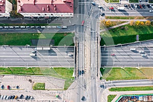 Urban road intersection with traffic bridge. aerial photo