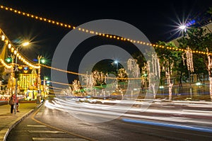 Urban road with light trails from cars at night
