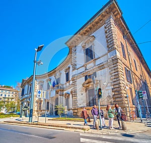 The urban scene of Via Senato with unique historic Palazzo del Senato, Milan, Italy