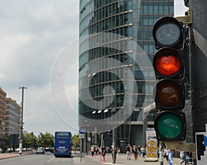 Urban scenery with traffic lights showing the red light - selective focus