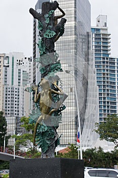 Urban sculpture in the capital of Panama on the background of skyscrapers