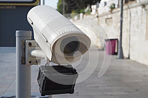 Urban security camera placements near vehicles captured in video footage