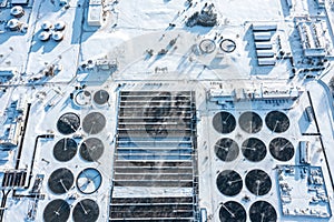 Urban sewage water treatment plant. aerial view in winter cold sunny day