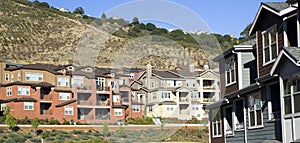 Urban Sprawl Dwellings Spring up For Domestic Living on Hillside photo