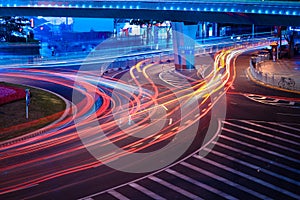 Urban street with light trails