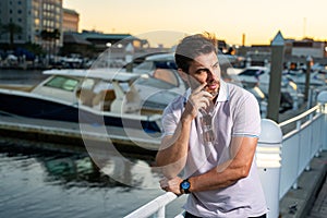 Urban style guy with casual clothes walk in Tampa city. Portrait of attractive man with casual clothes walk in American