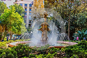 Urban summer landscape of Alicante fuente la aguadora with photo and trees in spain photo