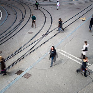 Urban traffic concept - city street with a motion blurred crowd