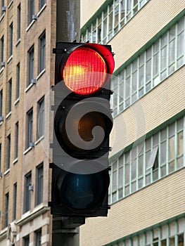 Urban traffic light on red