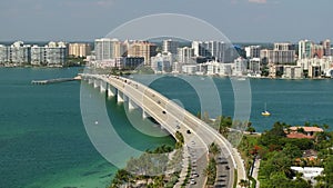 Urban travel destination in the USA. Sarasota city downtown with Ringling Bridge and expensive waterfront high-rise
