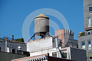 Urban water towers and rooftops