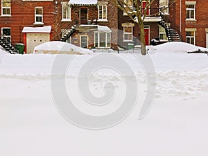 Urban winter street after snowstorm