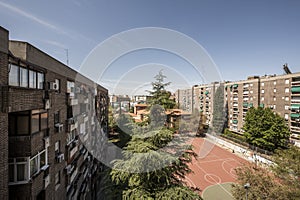 Urbanization facades of residential buildings surrounded by trees