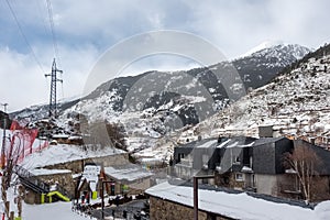 Urbanization of mountain houses next to the ski slopes in the Pyrenees, El Tarter, Andorra.