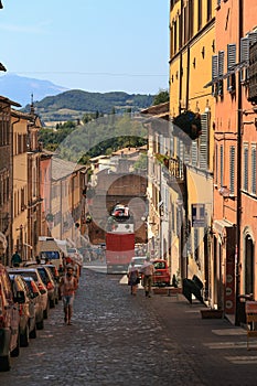 Urbino, Italy - August 9, 2017: A small street in the old town of Urbino. sunny day.