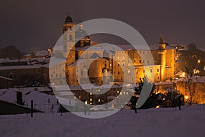 Urbino with snow at twilight, city and World Heritage Site in the Marche region of Italy