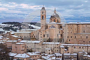 Urbino at winter sunset with snow