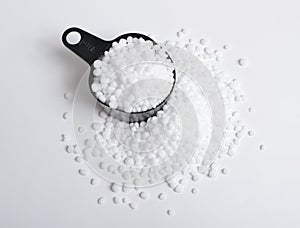 Urea, also called carbamide on white background