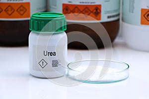 Urea in bottle , chemical in the laboratory and industry