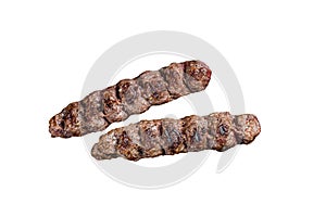 Urfa kebab, ground beef and lamb meat grilled on skewers. Isolated on white background.