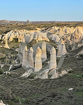 Urgup fairy chimneys, tourism symbol of Turkey, stone houses, timeless places, vacation and life
